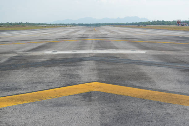 istock Stopway of a runway with yellow chevron marking 693492478