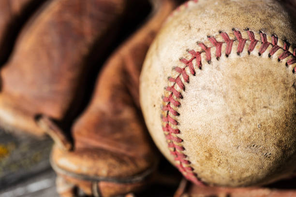 istock Vintage Baseball and Glove 693502032