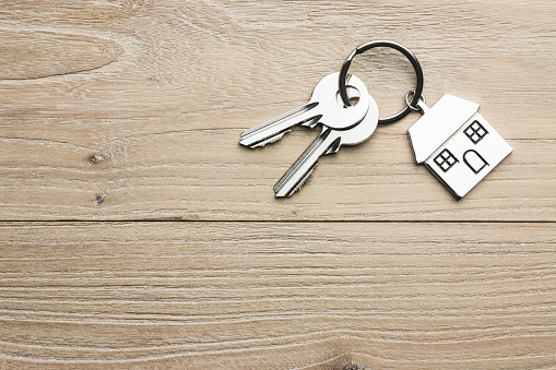 House-shaped key in the wood