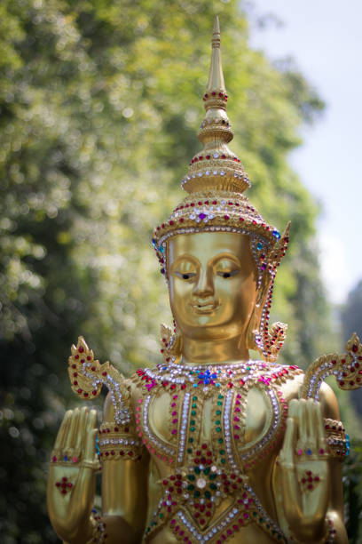 istock Golden Buddha statue in public temple at Thailand 693504484