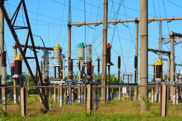 istock High-voltage power lines against the blue sky. 693507604