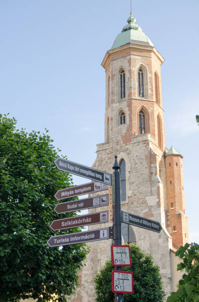 istock Maria Magdolna Tower with directions indications pole in foreground 693523080