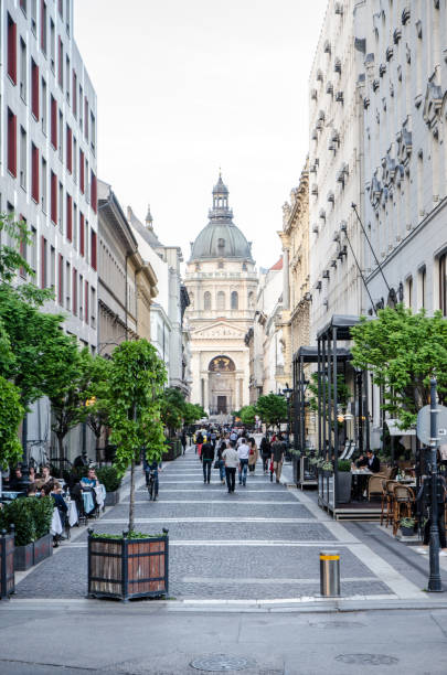 istock Facade of Budapest Basilica with crowded street 693523112
