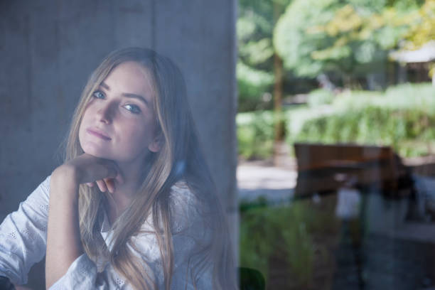 istock Young woman in cafe 693529010
