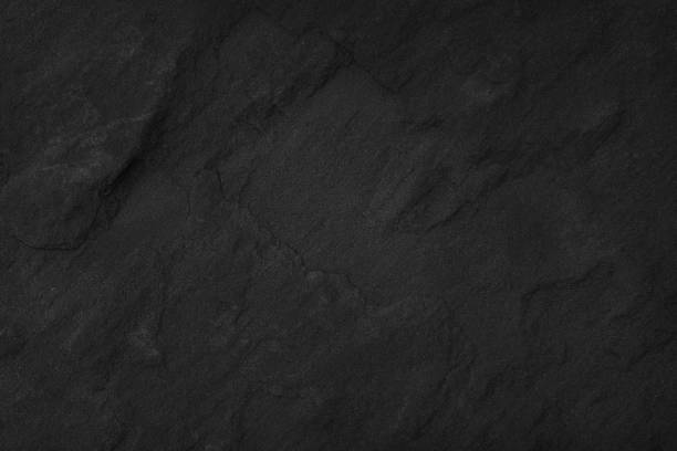 istock Black Stone background. Dark gray texture close up high quality May be used blank for design. Copy space 693530072