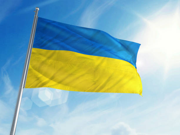 istock Ukraine Flag on a Cloud Background 693531558
