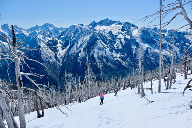 istock Woman  walking in mountains. 693531822