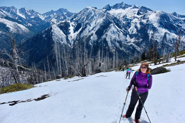 istock Group of friends hiking in mountains. 693531950