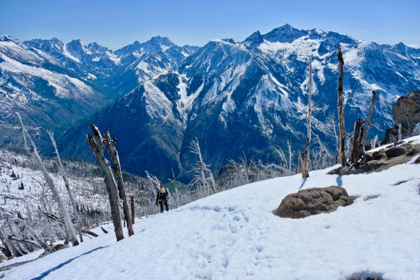istock Woman  walking in mountains. 693532070