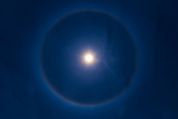 istock sky sun halo phenomenon in blue dark blue sky. 693548366