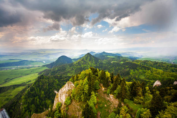 istock Panorama of mountains and clouds 693557178