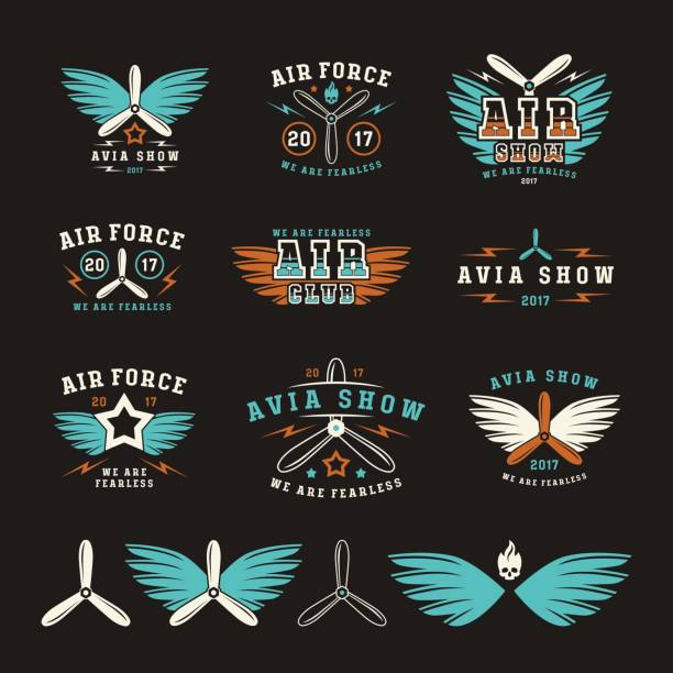 Set of air force and air show emblem Set of air force and air show emblem. Color print on black background air show stock illustrations