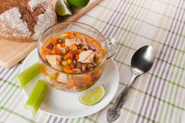 istock Mexican soup with chicken, celery and vegetables 693569846