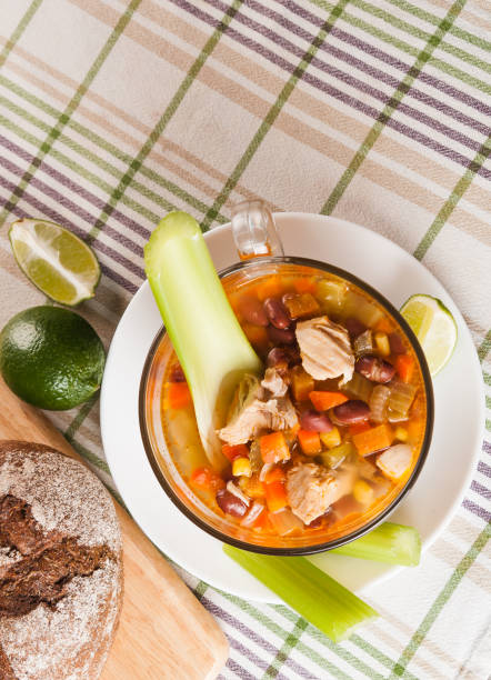 istock Mexican soup with chicken, celery and vegetables 693569876