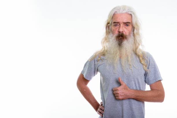istock Studio shot of senior bearded man giving thumb up 693570164