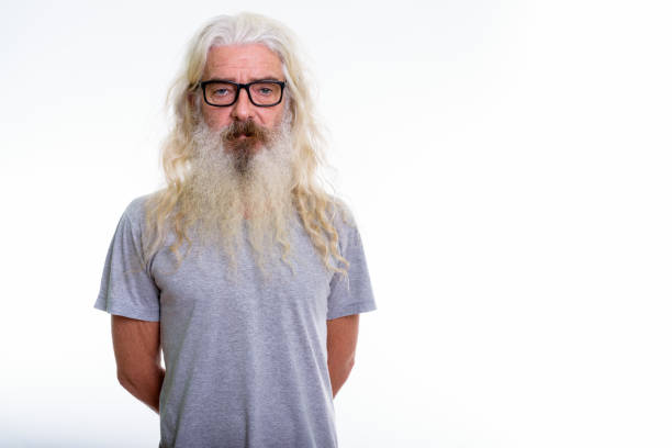 istock Studio shot of senior bearded man wearing eyeglasses 693570368