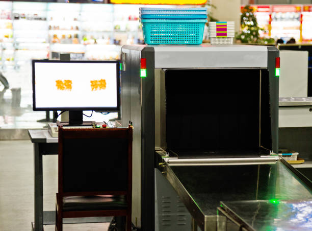 istock Luggage security x ray machine and computer monitor 693576018
