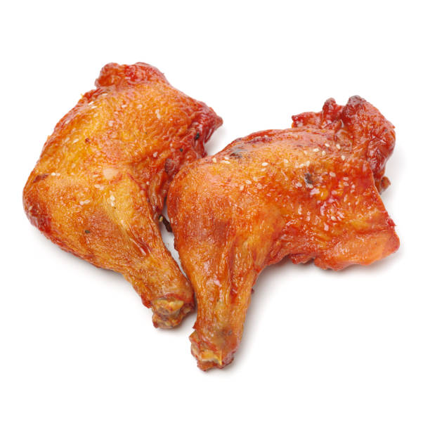 istock deep fry chicken thigh isolated on white 693582764