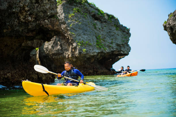istock Friends playing at the beach in Okinawa 693583530