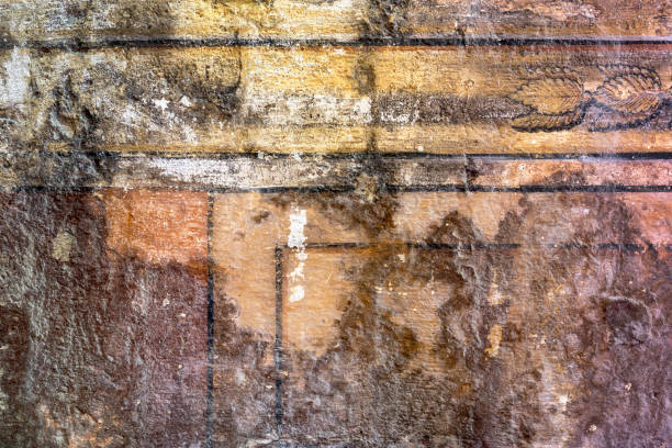 istock Old masonry with faded ancient painting, can be used as background 693585654