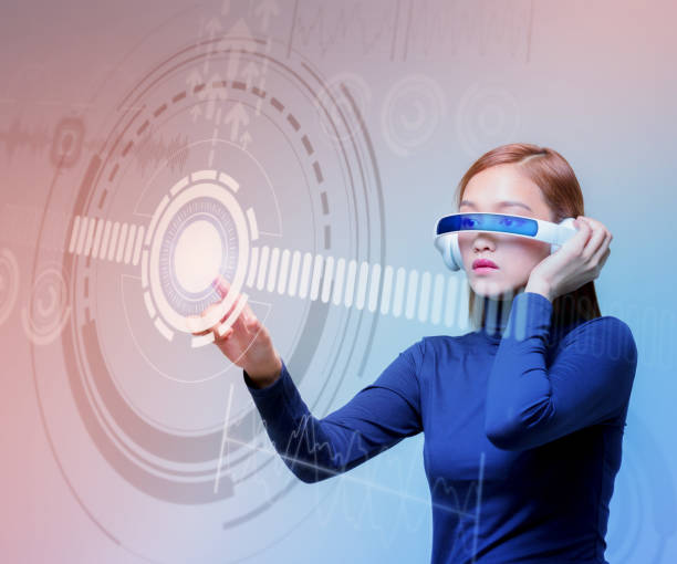 istock woman wearing smart glasses and futuristic graphical user interface 693585916