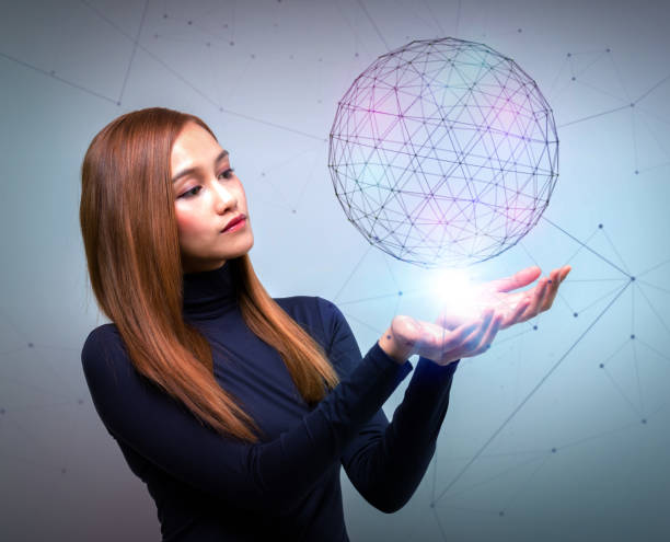 istock young woman looking at a abstract object floating on her hands, communication network concept. 693586050