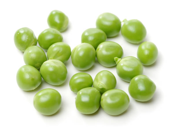 istock Fresh Green peas  isolated on white 693586282