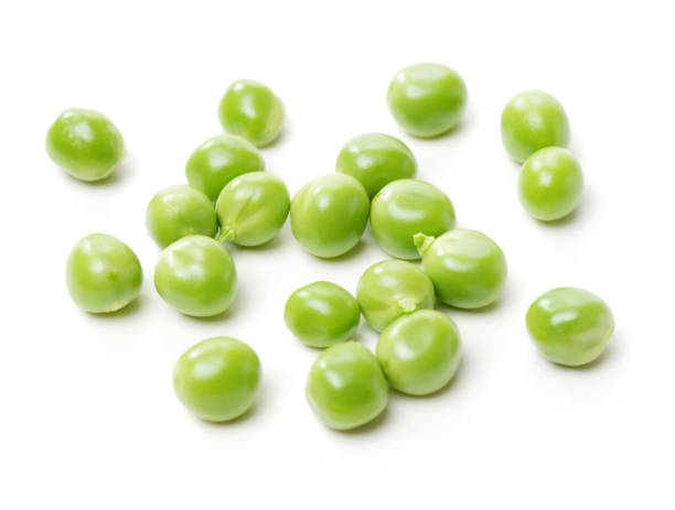 istock Fresh Green peas  isolated on white 693586438