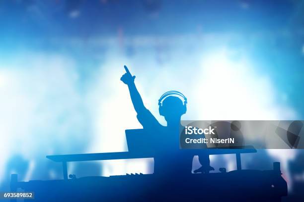 Club Disco Dj Playing And Mixing Music For People Nightlife Stock Photo - Download Image Now