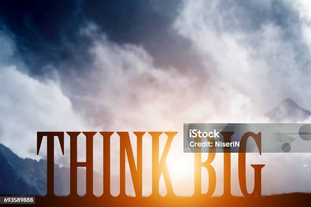 Think Big Text On Mountains Landscape Sunset Sky Motivational Stock Photo - Download Image Now
