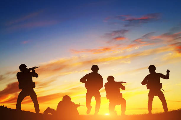 istock Soldiers in assault. War, army, military. 693590010