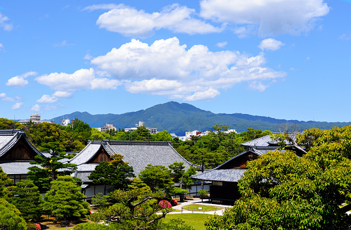 Kyoto, Japan - June 5, 2017: Honmaru Palace with Mount Hiei in the background, Nijo Castle, Kyoto, Japan