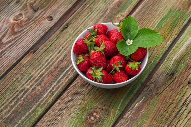 istock Fresh strawberry on wooden background,with copy space. 693605046