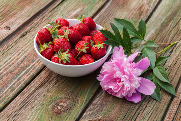 istock Fresh strawberry on wooden background,with copy space. 693605098