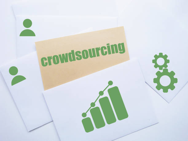 istock Crowdsourcing concept. On the texture objects of business. 693610556