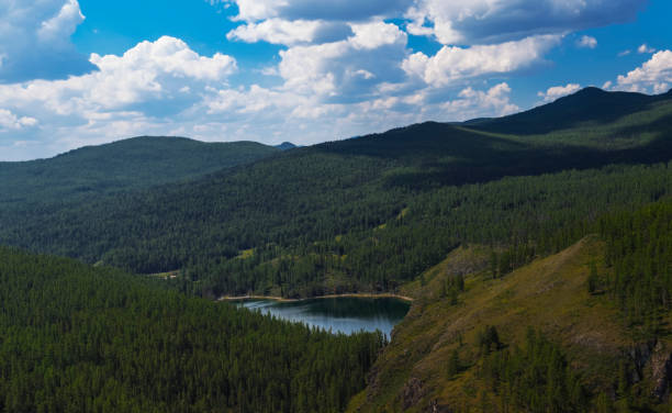 istock lake in mountains. Altai Russia 693617506