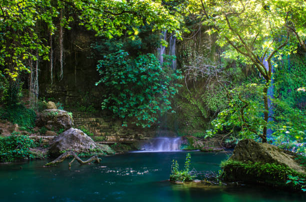 istock Beautiful waterfall in deep forest at Antalya, Turkey, Middle East. 693622974