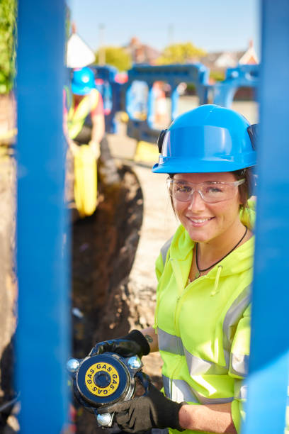 istock female gas engineer portrait 693623750