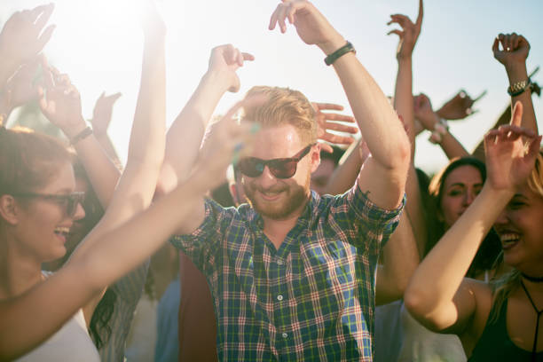 istock Big crowd of people having a party 693623800