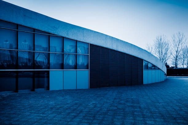istock modern business building in financial district with empty square/pavement/space 693624080