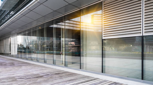istock modern business building in financial district with empty square/pavement/space 693624284
