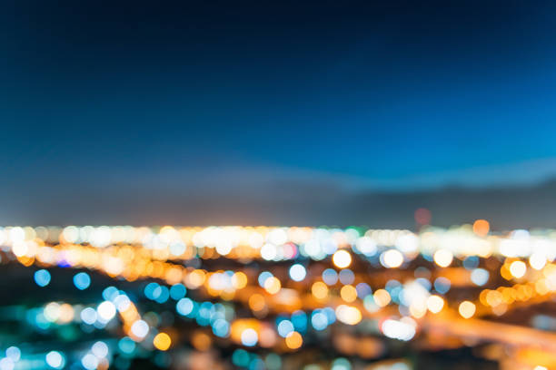 istock City bokeh and light of the lamp post. 693627638