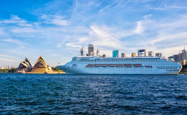 Sydney Australia - April 1, 2016: The P&O cruise ship Pacific Jewel slowly steams past the Sydney Opera House on a bright Autumn afternoon.