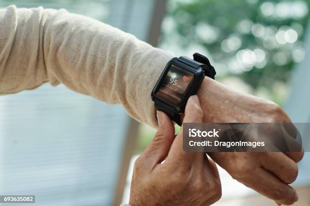 Wrinkled Hand With Fitness Tracker Stock Photo - Download Image Now - Fitness Tracker, Smart Watch, Healthy Lifestyle