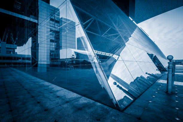 istock modern business building in financial district with empty square/pavement/space 693636572