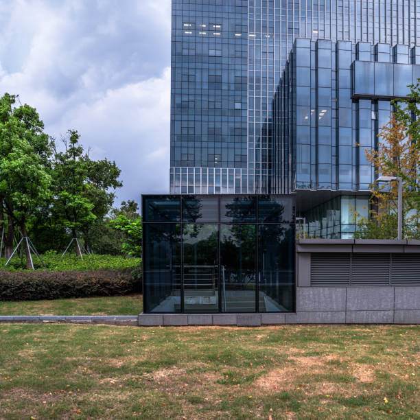 istock modern business building in financial district with empty square/pavement/space 693636650