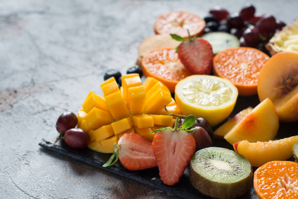 istock Raw fruits and berries platter 693646764