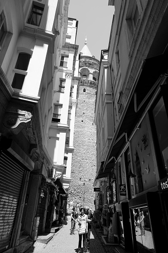 Istanbul,Turkey-June 04,2017:Street View of Galata Tower.People walking on the street.