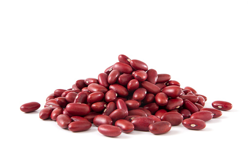 Heap of red kidney beans on white background.