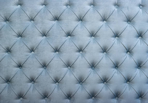 blaue capitone getuftet polsterung stoff - leather headboard stock-fotos und bilder